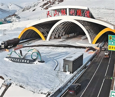 _The road at the tunnel exit may be icy in winter_The road at the tunnel exit in winter